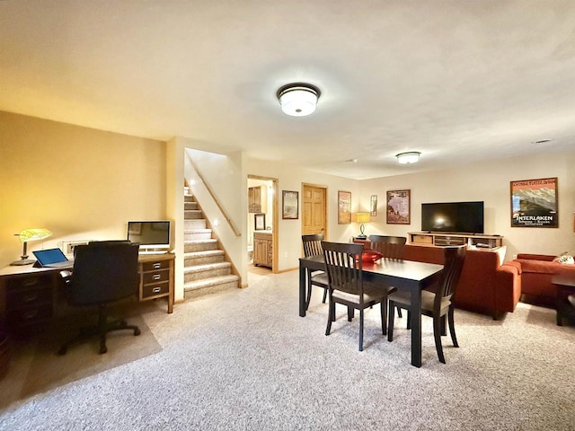 2728 E Ridge Rd, Beloit, WI 53511 - dining room with carpet, stairs, and a desk