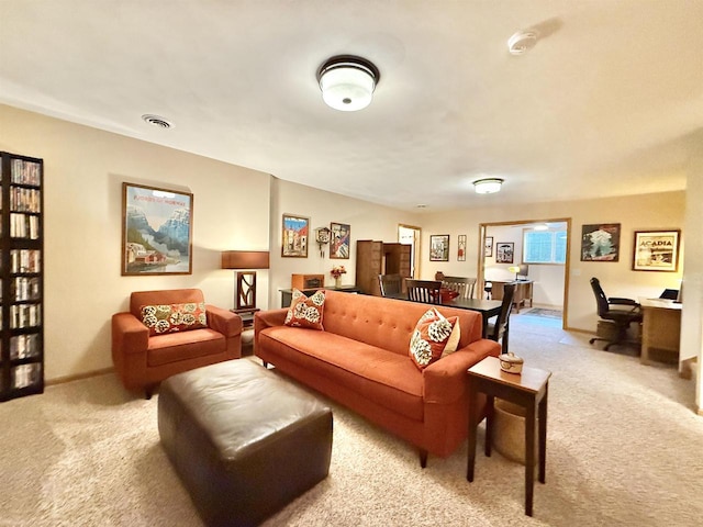2728 E Ridge Rd, Beloit, WI 53511 - living room with light colored carpet, baseboards, and an office area