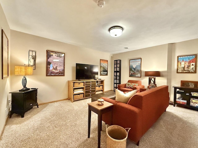 2728 E Ridge Rd, Beloit, WI 53511 - living room with carpet floors, a wood stove, and baseboards