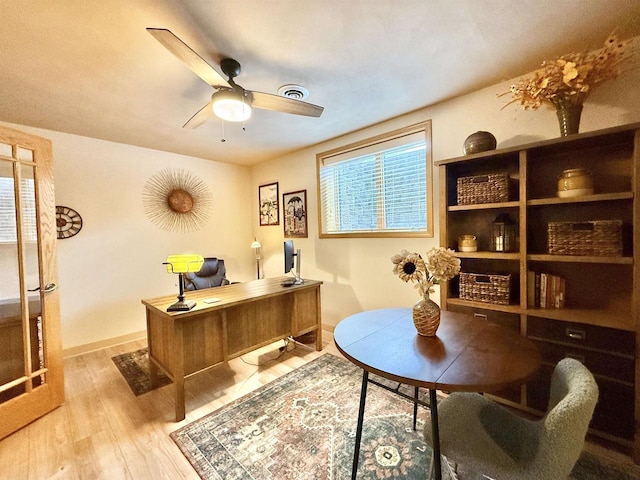 2728 E Ridge Rd, Beloit, WI 53511 - home office featuring ceiling fan, wood finished floors, healthy amount of natural light, and baseboards