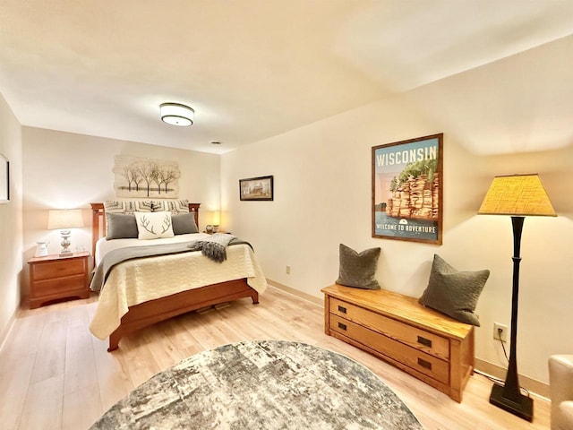 2728 E Ridge Rd, Beloit, WI 53511 - bedroom with light wood-style floors and baseboards