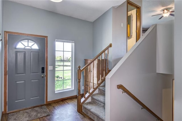 N4907 572nd St, Menomonie, WI 54751 - foyer entrance with wood finished floors, baseboards, and ceiling fan