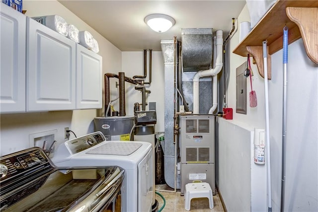 N4907 572nd St, Menomonie, WI 54751 - laundry area with cabinet space, independent washer and dryer, gas water heater, heating unit, and light tile patterned flooring