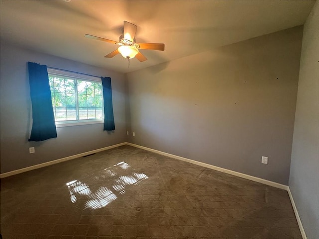 N2673 464th St, Menomonie, WI 54751 - unfurnished room with a ceiling fan, carpet, and baseboards