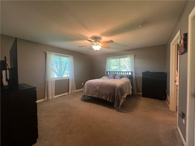 N2673 464th St, Menomonie, WI 54751 - carpeted bedroom featuring baseboards and a ceiling fan