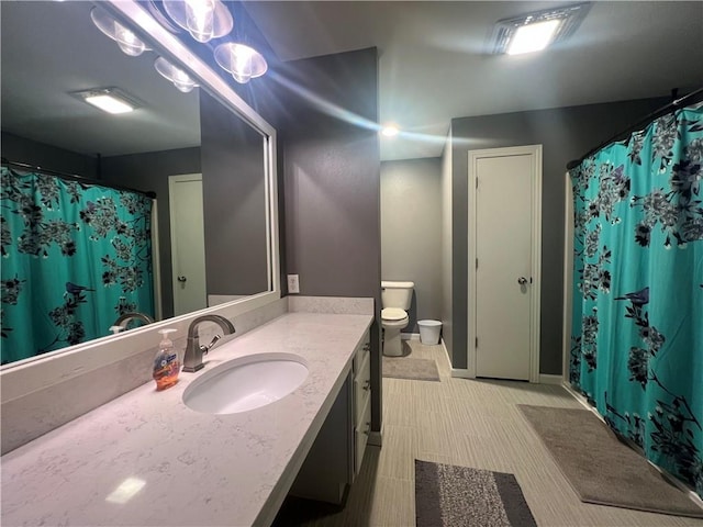 N2673 464th St, Menomonie, WI 54751 - full bathroom with vanity, toilet, and a shower with shower curtain