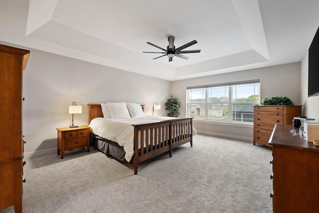 788 Kohlwey Dr, Grafton, WI 53024 - bedroom featuring a raised ceiling, carpet flooring, baseboards, and ceiling fan
