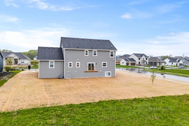 788 Kohlwey Dr, Grafton, WI 53024 - rear view of property featuring a residential view and a shingled roof