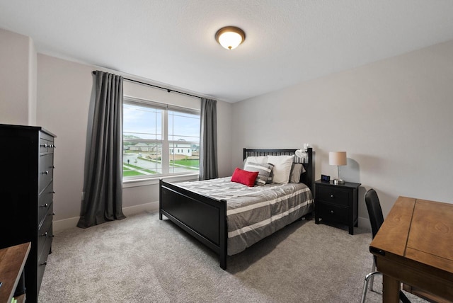788 Kohlwey Dr, Grafton, WI 53024 - bedroom featuring light colored carpet and baseboards