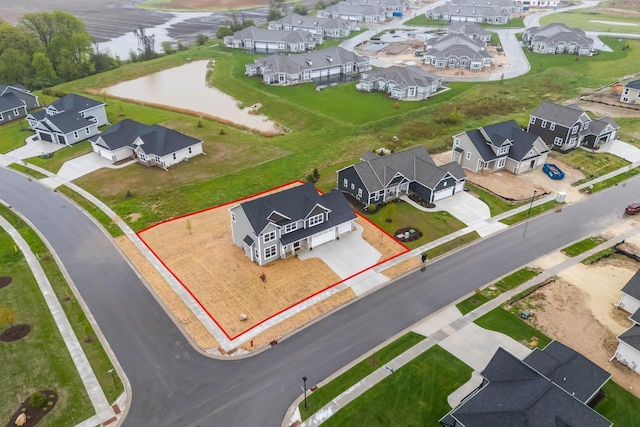 788 Kohlwey Dr, Grafton, WI 53024 - aerial perspective of suburban area featuring property parcel outlined and a large body of water