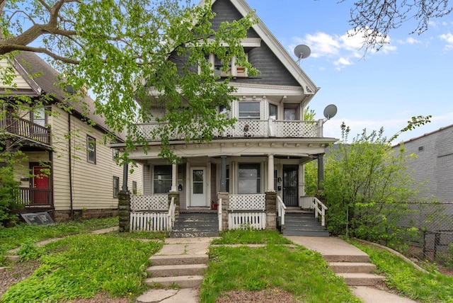 3421 W Clybourn Ave Unit 3423, Milwaukee, WI 53208 - victorian house with a porch