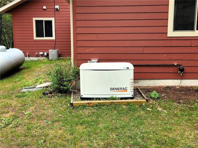 4315 Hector Dam Rd, Shell Lake, WI 54871 - exterior view of a power unit and heating fuel tank