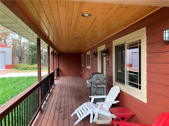4315 Hector Dam Rd, Shell Lake, WI 54871 - deck with a grill and a yard