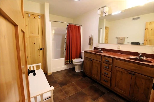 4315 Hector Dam Rd, Shell Lake, WI 54871 - full bath with shower / tub combo with curtain, double vanity, toilet, and tile patterned flooring