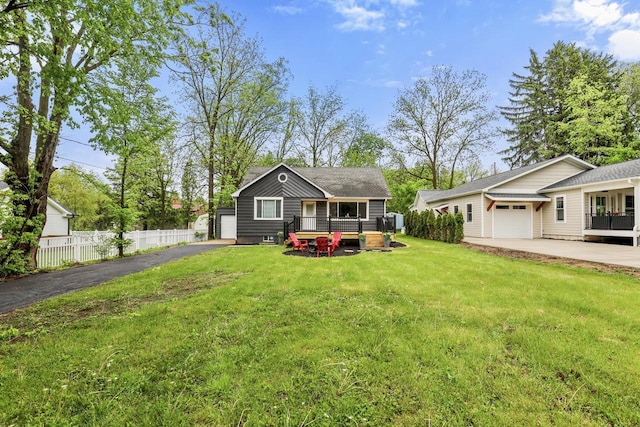 71 Menomonee St, Williams Bay, WI 53191 - view of front of home featuring an attached garage and driveway