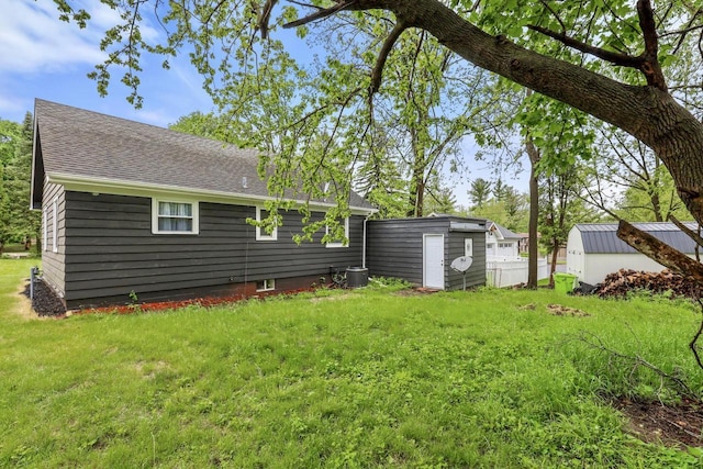 71 Menomonee St, Williams Bay, WI 53191 - view of green lawn with central air condition unit