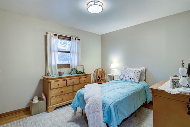 616 E Polk Ave, Eau Claire, WI 54701 - bedroom with wood finished floors and baseboards
