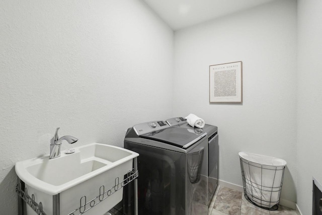 6655 Royal View Dr, Windsor, WI 53532 - washroom featuring washer and dryer and baseboards