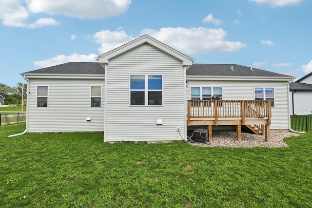 6655 Royal View Dr, Windsor, WI 53532 - rear view of property featuring a wooden deck and a shingled roof