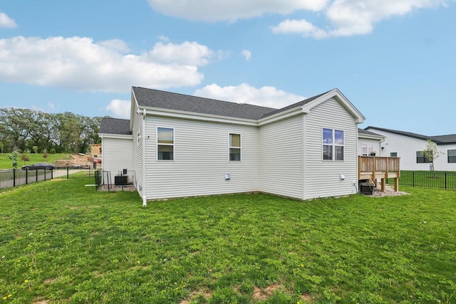 6655 Royal View Dr, Windsor, WI 53532 - rear view of house featuring central air condition unit and roof with shingles