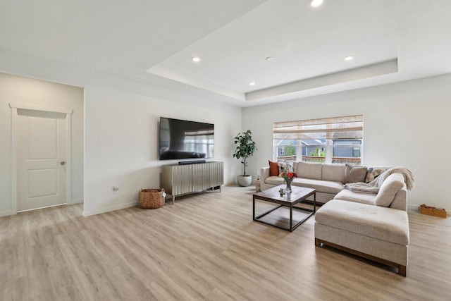 6655 Royal View Dr, Windsor, WI 53532 - living room with light wood-style floors, recessed lighting, a raised ceiling, and baseboards