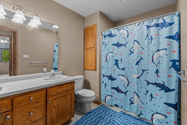 3196 Hidden Pond Rd, Green Bay, WI 54313 - bathroom featuring vanity, toilet, tile patterned floors, and a shower with shower curtain