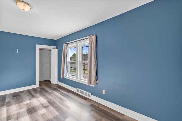 5432 25th Ave, Kenosha, WI 53140 - unfurnished room with baseboards and wood finished floors