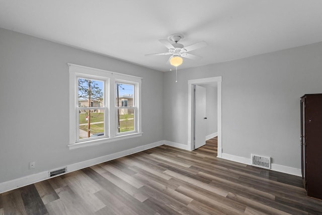 5432 25th Ave, Kenosha, WI 53140 - empty room featuring a ceiling fan, baseboards, and wood finished floors