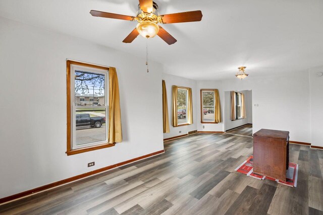5432 25th Ave, Kenosha, WI 53140 - empty room featuring baseboards, wood finished floors, and ceiling fan