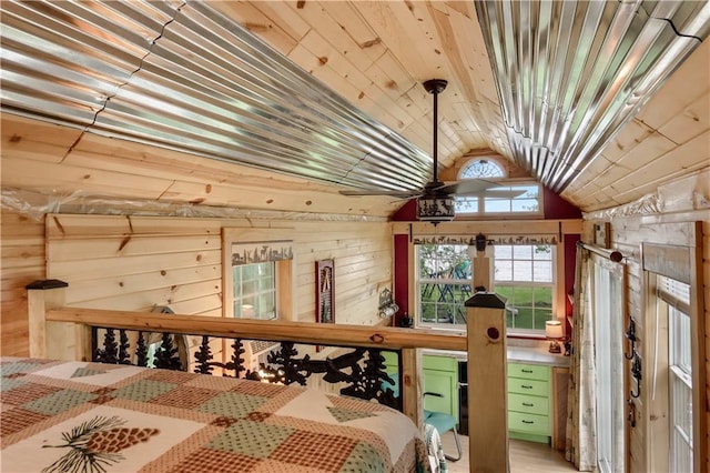 630 W Lake Dr, Shell Lake, WI 54871 - bedroom with lofted ceiling, wooden walls, and wooden ceiling