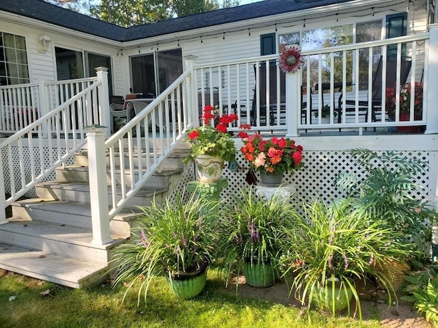 630 W Lake Dr, Shell Lake, WI 54871 - property entrance featuring a wooden deck