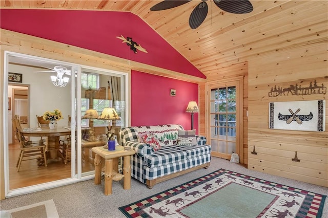 630 W Lake Dr, Shell Lake, WI 54871 - carpeted living area with lofted ceiling, a ceiling fan, wood walls, and wooden ceiling
