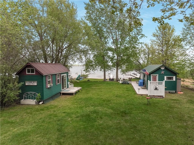 630 W Lake Dr, Shell Lake, WI 54871 - view of grassy yard with an outdoor structure