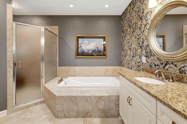 845 Lake Rd Unit D, Brookfield, WI 53005 - bathroom featuring vanity, a stall shower, a garden tub, recessed lighting, and tile patterned floors