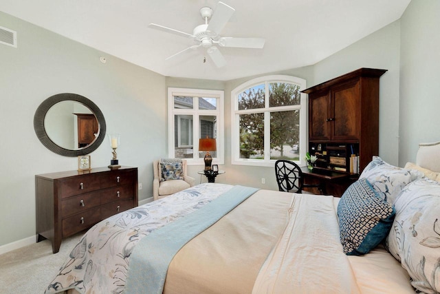845 Lake Rd Unit D, Brookfield, WI 53005 - bedroom with light colored carpet, baseboards, and a ceiling fan