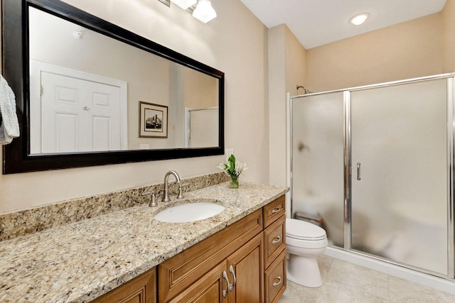 845 Lake Rd Unit D, Brookfield, WI 53005 - bathroom with toilet, vanity, a stall shower, and tile patterned floors