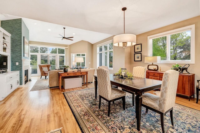 845 Lake Rd Unit D, Brookfield, WI 53005 - dining space with plenty of natural light, light wood finished floors, a ceiling fan, a glass covered fireplace, and recessed lighting
