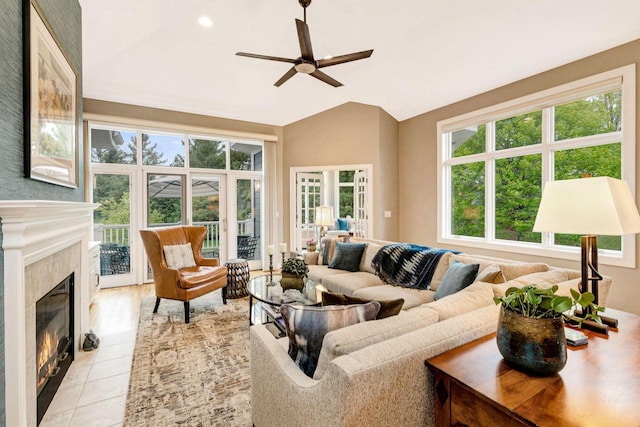 845 Lake Rd Unit D, Brookfield, WI 53005 - living area with vaulted ceiling, a premium fireplace, a ceiling fan, light tile patterned floors, and recessed lighting