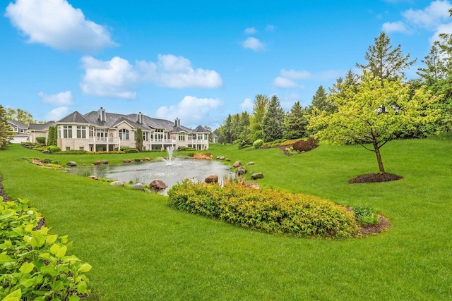 845 Lake Rd Unit D, Brookfield, WI 53005 - view of green lawn featuring a water view