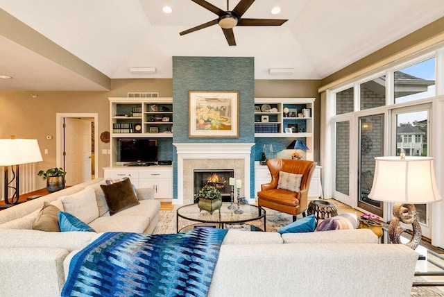 845 Lake Rd Unit D, Brookfield, WI 53005 - living room featuring ceiling fan, a warm lit fireplace, wood finished floors, vaulted ceiling, and recessed lighting