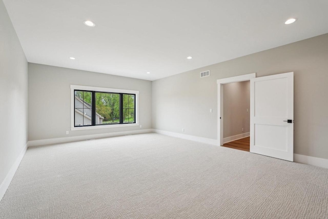 N67W27095 Fanad Dr, Lisbon, WI 53089 - carpeted empty room with baseboards and recessed lighting
