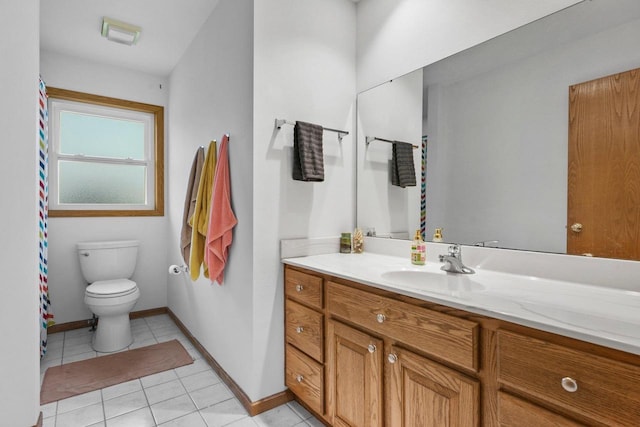 517 Brule Pkwy, Deforest, WI 53532 - full bathroom featuring vanity, toilet, tile patterned floors, baseboards, and a shower with curtain