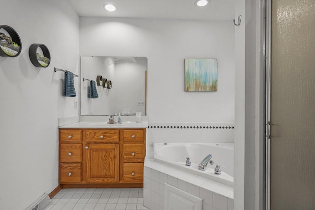 517 Brule Pkwy, Deforest, WI 53532 - full bath featuring vanity, a jetted tub, tile patterned flooring, recessed lighting, and a shower stall