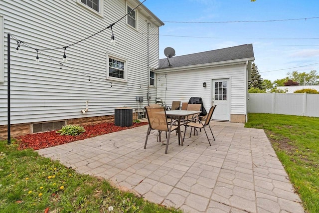 144 Lau St, Green Bay, WI 54302 - view of patio / terrace with cooling unit and outdoor dining space