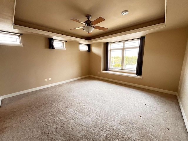 1021 W Pleasant St Unit 5, Portage, WI 53901 - carpeted spare room featuring a raised ceiling, plenty of natural light, and baseboards