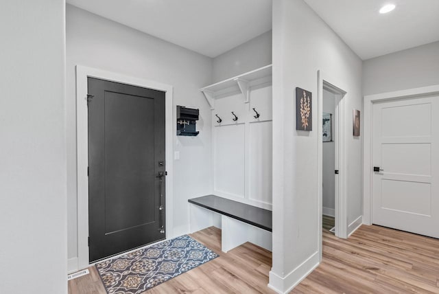 6340 Congress Dr, West Bend, WI 53095 - mudroom featuring light wood finished floors, baseboards, and recessed lighting