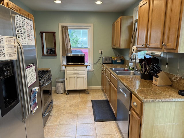 2775 S 53rd St, Milwaukee, WI 53219 - kitchen featuring stainless steel appliances, a sink, recessed lighting, baseboards, and light tile patterned floors