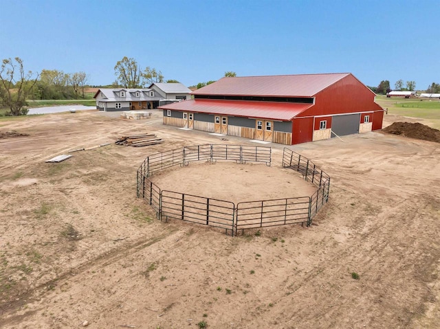 5780 County Road V, Gillett, WI 54124 - view of property's community with a detached garage, an outdoor structure, and an exterior structure