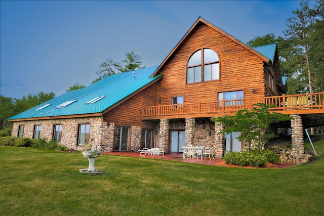 W6887 Two Mile Rd, Porterfield, WI 54159 - rear view of property featuring stone siding, a lawn, and metal roof