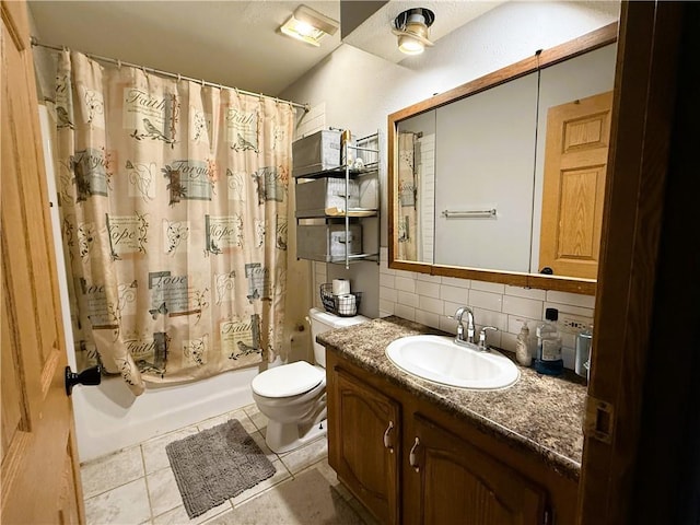 1051 E Chippewa Ave, Bruce, WI 54819 - full bathroom featuring backsplash, vanity, toilet, tile patterned floors, and shower / bath combo with shower curtain